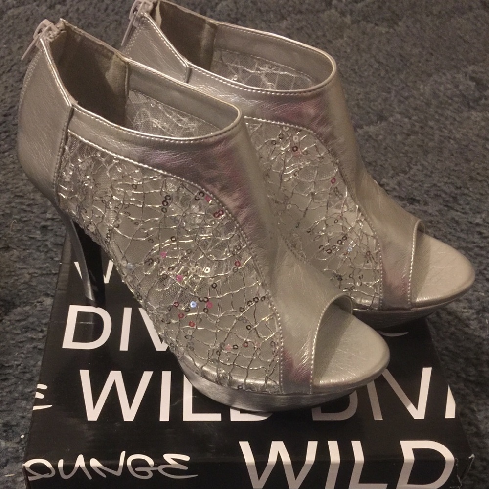 Silver dress heels brand new never worn